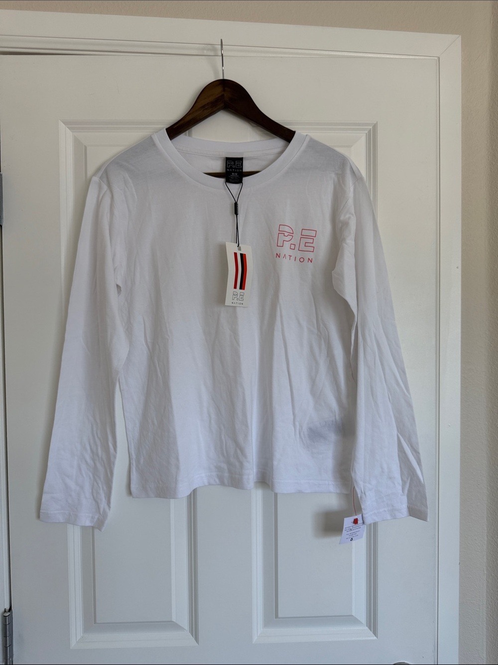 P.E Nation White Long Sleeve Tee with Pink Logo